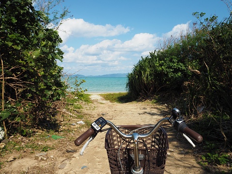 Cycling to the beach. Kohama Island, Okinawa, Japan.