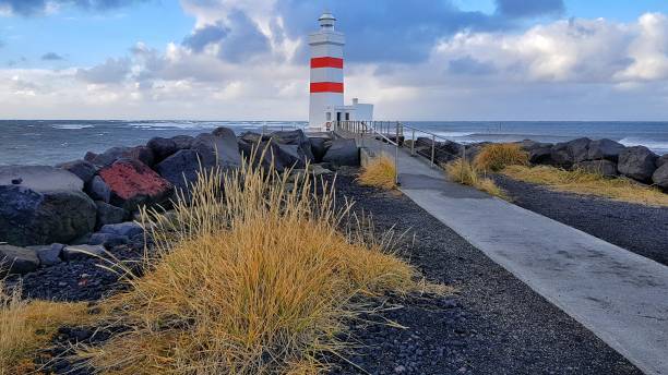 istock lighthouse on the atlantic ocean coast in Iceland 1126703954