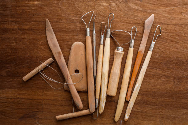 istock composition of sculptors tools on wooden background 1126705294