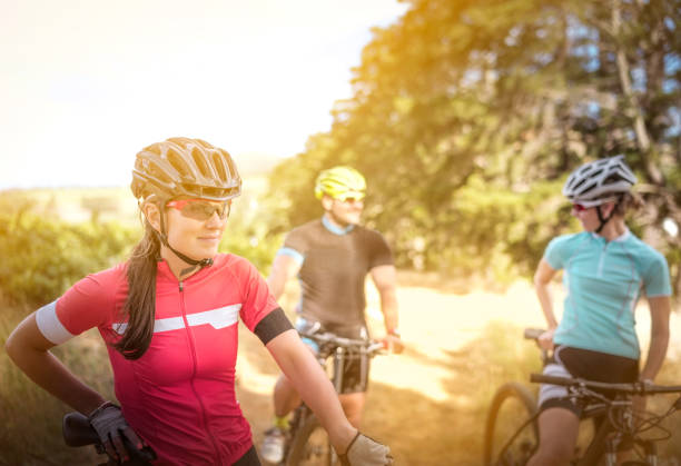 istock Thoughtful cyclist standing on field during summer 1126707352