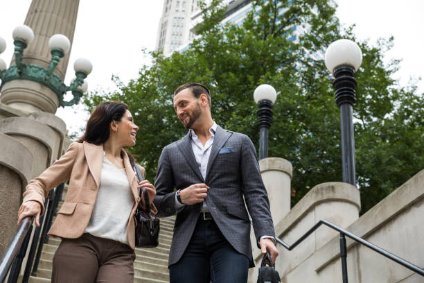 istock Office collegaues in downtown Chicago - Business people commuting to work 1126709648