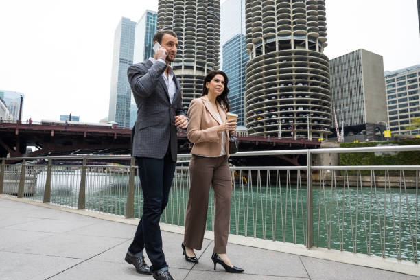 istock Office collegaues in downtown Chicago - Business people commuting to work 1126709698