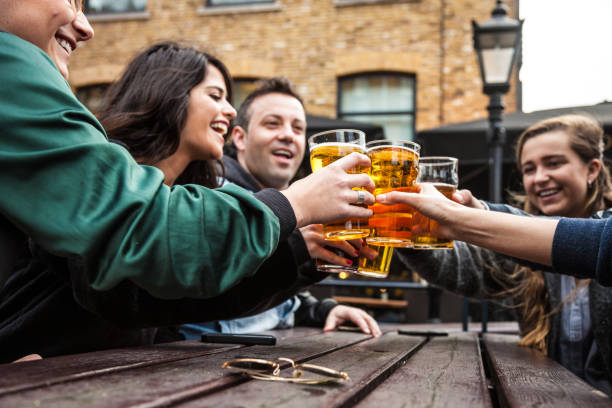 istock Cheers with a fresh beer in a London Pub 1126710700