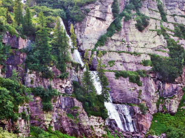 istock Murgbachfall waterfall on the Murgbach stream and under the Mittlerer Murgsee lake 1126716793