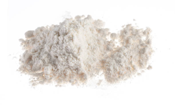 istock Pile of flour isolated on white background 1126718981