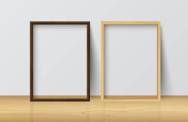 istock Realistic Square Light Wood and Dark Wood Blank Picture frame,standing on Light Wood Floor at 1126720003