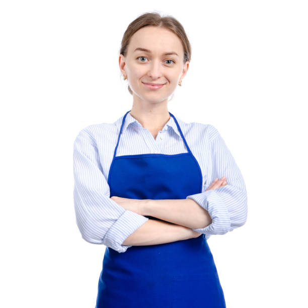 istock Woman in blue apron smile 1126720191