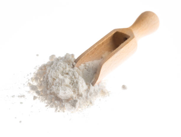 istock flour with wooden scoop isolated on white background 1126720202