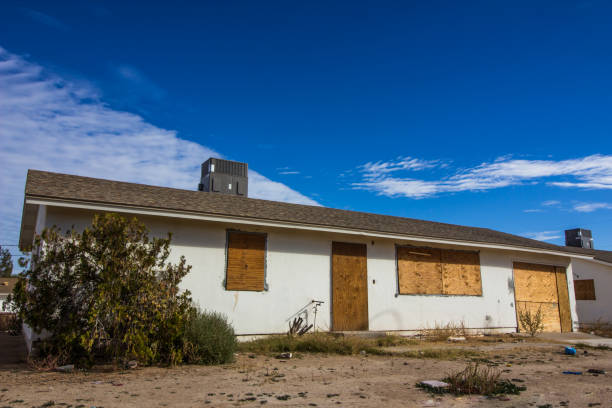 istock Abandoned House With Boarded Up Windows 1126724552