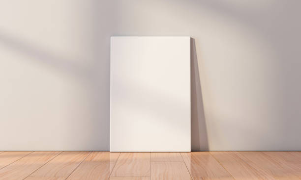 istock White Canvas Mockup standing on the floor in empty room 1126725392