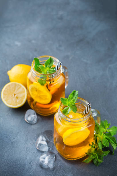 istock Lemon mint iced tea cocktail refreshing drink for summer days 1126726032