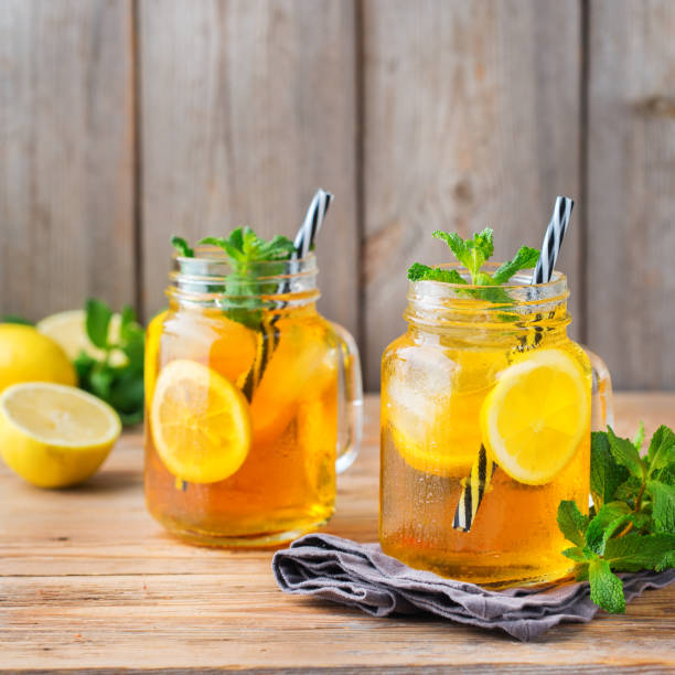 istock Lemon mint iced tea cocktail refreshing drink for summer days 1126726095