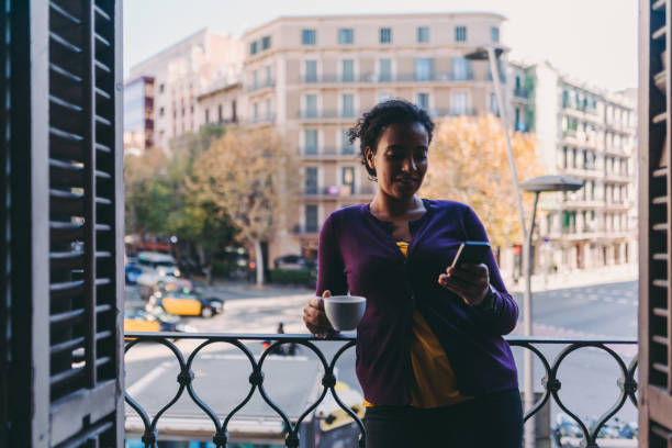 istock Woman in Spain drinking coffee at the terrace 1126728384