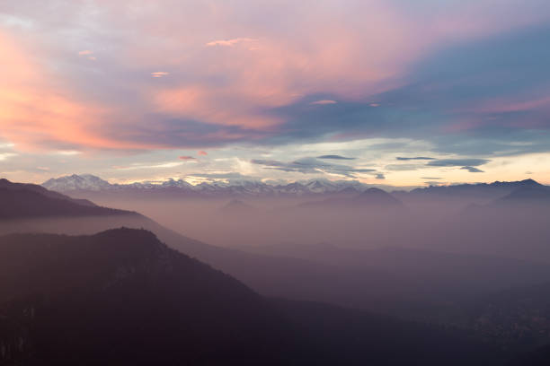 istock Alpine chain with Monte Rosa, colorful sunset with mist, Italy 1126731184