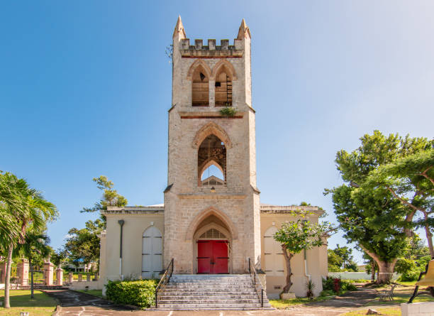 Church in Frederiksted, St Croix, USVI. Anglican church in St Croix, US Virgin Islands. Clear blue sky and bright colors. anglican eucharist stock pictures, royalty-free photos & images