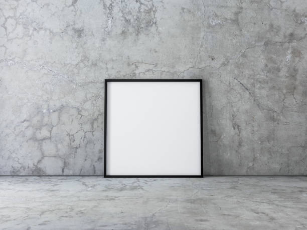 istock Square Canvas Poster with Black Frame Mockup standing on concrete floor 1126733189