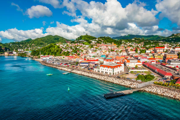 St George's, Grenada Bright and colorful image with buildings at the port of Grenada in the Caribbean. caribbean islands stock pictures, royalty-free photos & images