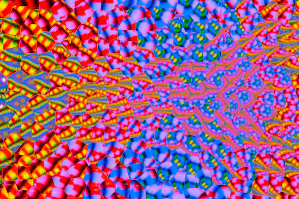An abstract textured background of a brightly colored image distorted through frosted glass