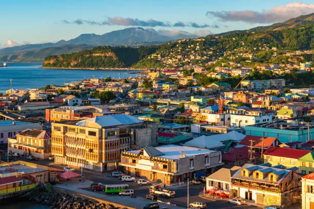 Beautiful image with buildings at the port of Roseau in the evening. Sunset time in Dominica, Caribbean.