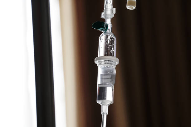 istock IV tube and bag saline solution, hospital 1126738787