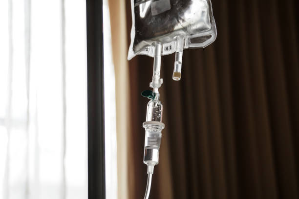 istock IV tube and bag saline solution, hospital 1126738796