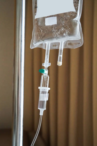 istock IV tube and bag saline solution, hospital 1126739064