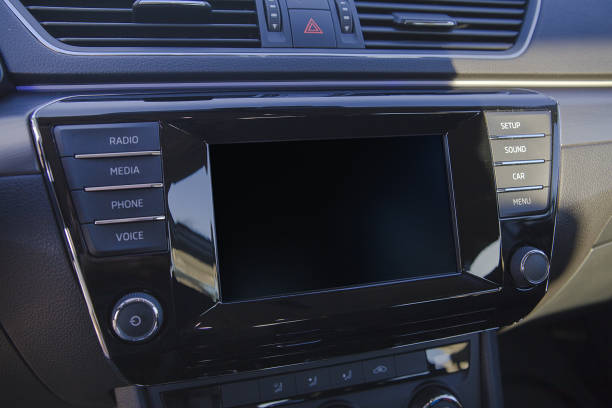 Interior of a modern automobile showing the dashboard. Interior of a modern automobile showing the dashboard. Car air conditioner. car door panels stock pictures, royalty-free photos & images