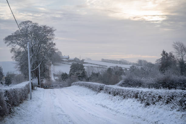 istock Snow covered road in northern Ireland 1126742432