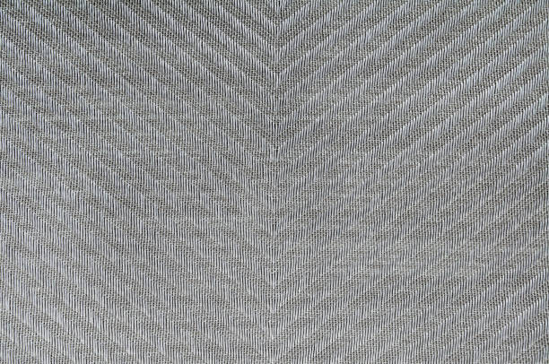 istock Closeup grey, silver color fabric texture.Grey fabric Herringbone pattern. design or upholstery abstract background. 1126746572