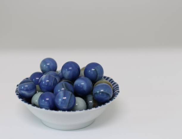 istock a handful of marbles 1126752351