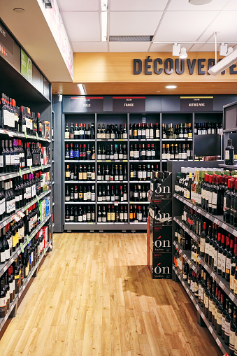 Montreal, Canada - June, 2018: Wine bottles on the shelves in a wine shop in Montreal, Canada. Editorial.