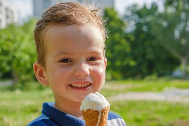 istock icecream child food boy eating 1126752850