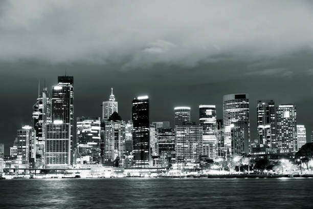 Black and white city skyline at night, background with copy space, Sydney Australia, full frame horizontal composition