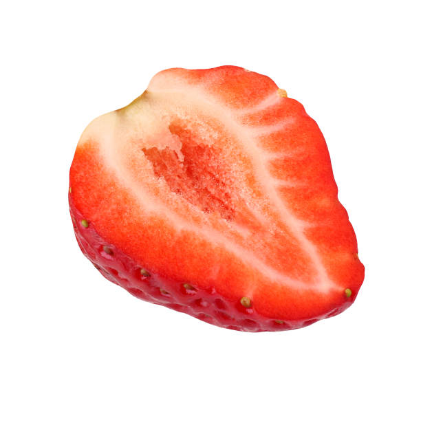 istock half of strawberry isolated on white background. 1126776839