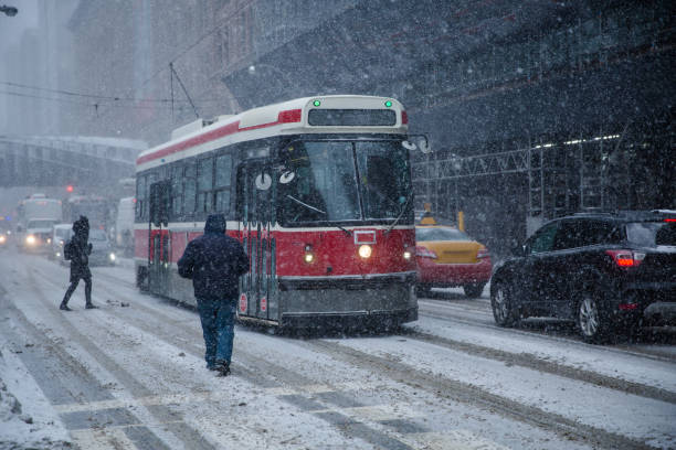 commuters on snow stock photo