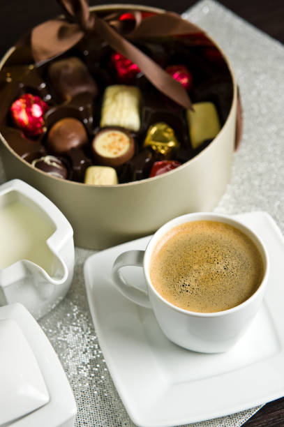 istock Cup of coffee and chocolates 1126781896