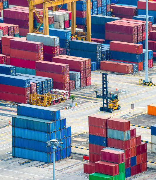 istock Freight containers in commercial port 1126785277