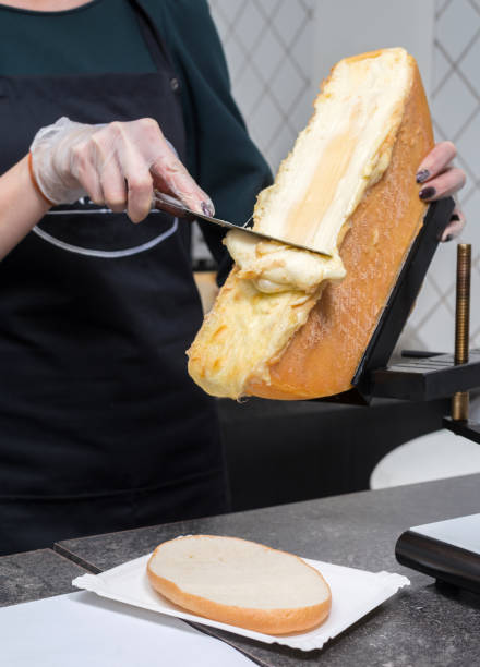 талый сыр - raclette cheese стоковые фото и изображения