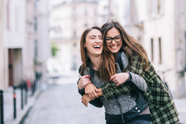 istock Happy girlfriends in the city 1126793453