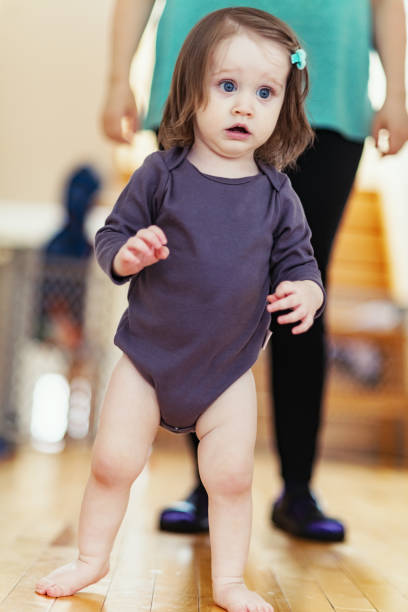 istock Baby Girl's First Steps 1126795648