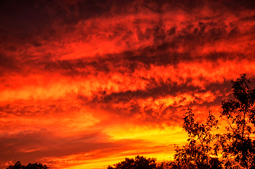 A dramatic orange and red sky and sunset in Torrington Connecticut.