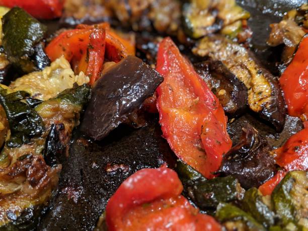 istock Red peppers, eggplant and zucchini 1126797356