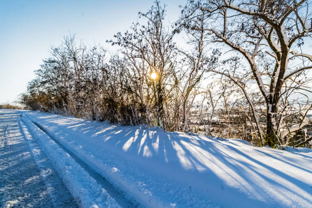 Snowdrift close-up with defocused bokeh lights. Space for copy.