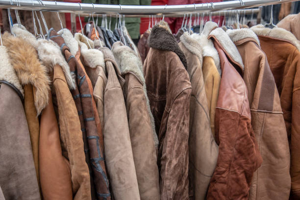 istock Second hand winter coats on a rack in a Berlin street flea market 1126804399