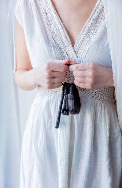 istock Woman holding old key in a hands 1126805644