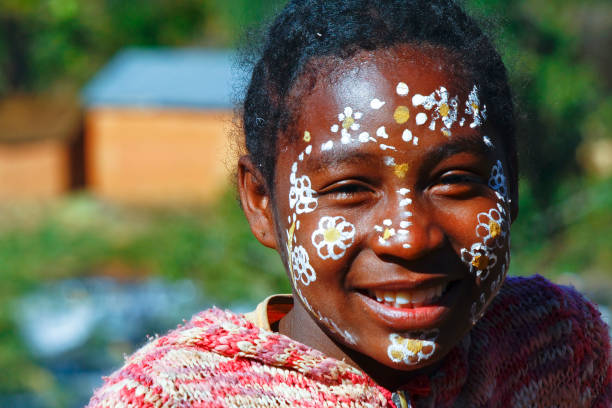 istock Girl with traditionally painted face, Madagascar 1126806256