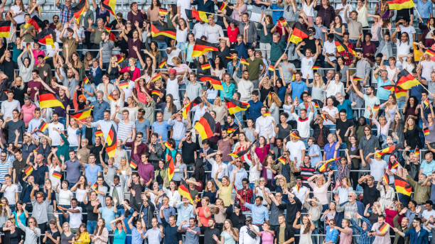istock Germany supporters waving their flags on a stadium 1126806379