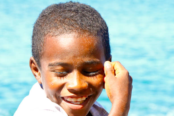 istock Portrait of happy malagasy boy 1126809553
