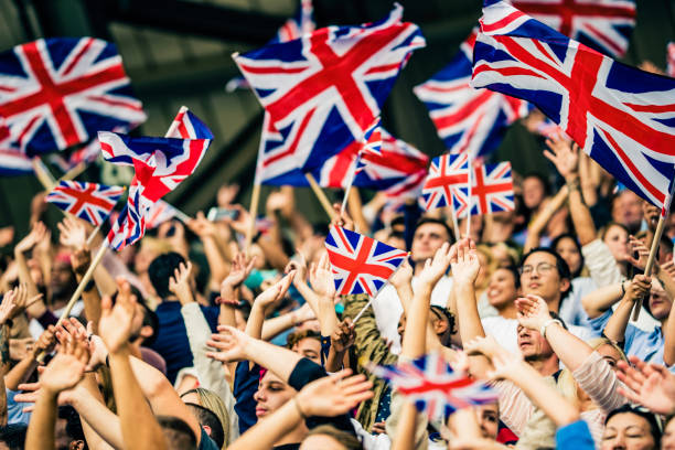 wave your flag - british flag imagens e fotografias de stock