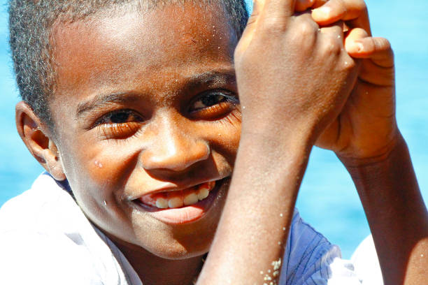 istock Portrait of happy malagasy boy 1126811044